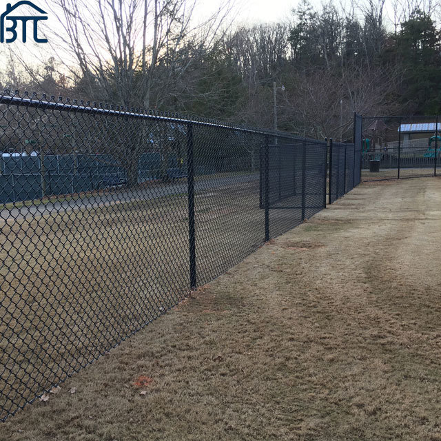 6 Foot 9 Gauge Chainlink Fence with Barbed Wire.