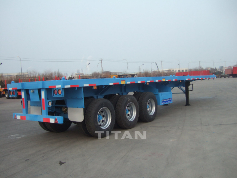 20FT 40FT Shipping Container Transport Semi Truck Trailer 3 Axle Used Flatbed Trailer for Sale/Flatbed Trailer with Front Wall Tri Axle 40FT Flat Bed Trailer