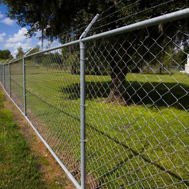 6 Foot 9 Gauge Chainlink Fence with Barbed Wire.