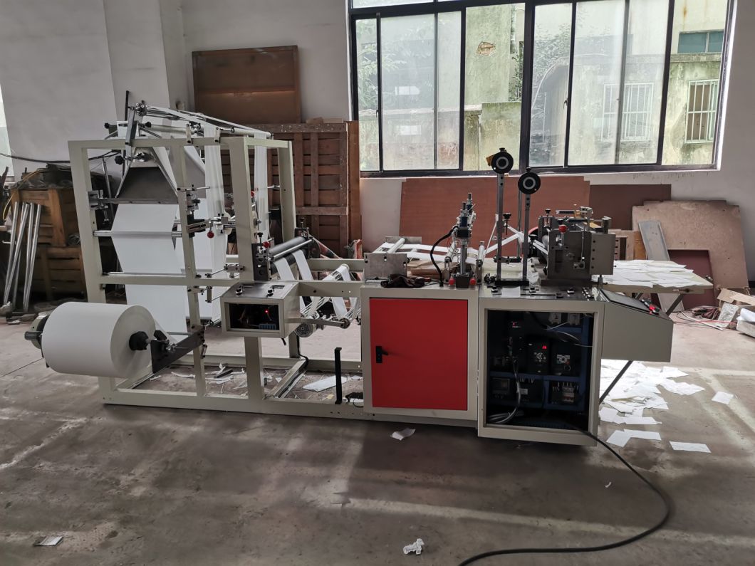 Tmd-700 High Speed 2-Channels Empty Non-Woven Bag Making Machine