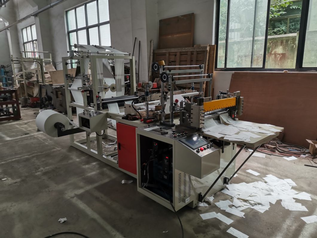 Tmd-700 High Speed 2-Channels Empty Non-Woven Bag Making Machine