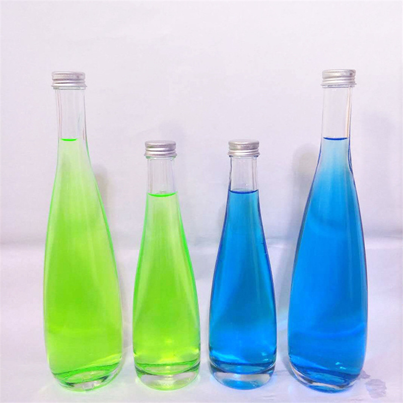 Embossed Super Flint Glass Large Stock Mineral Water Glass Bottle