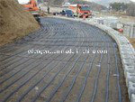 Uniaxial Polyester (PET) Geogrid PVC Coated for Retaining Wall Reinforcement