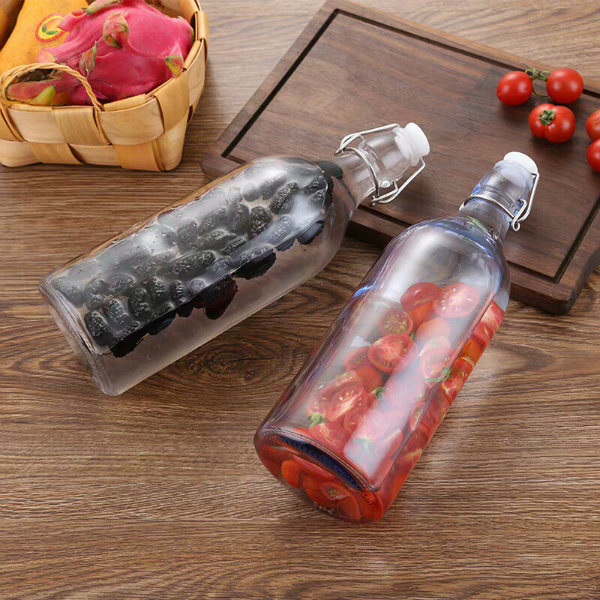 Hot Selling Transparent Glass Juice Bottles with Sealed Clasps
