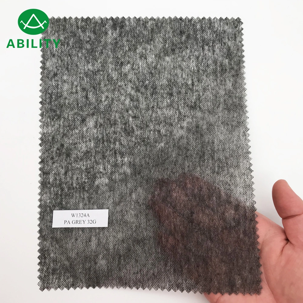 W1324A 100% Polyester Soft Microdot Adhesive Non Woven Lining
