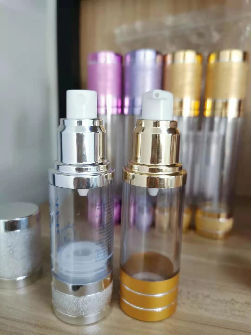 Care Cosmetic Gold Airless Pump Bottle with Silk Printing