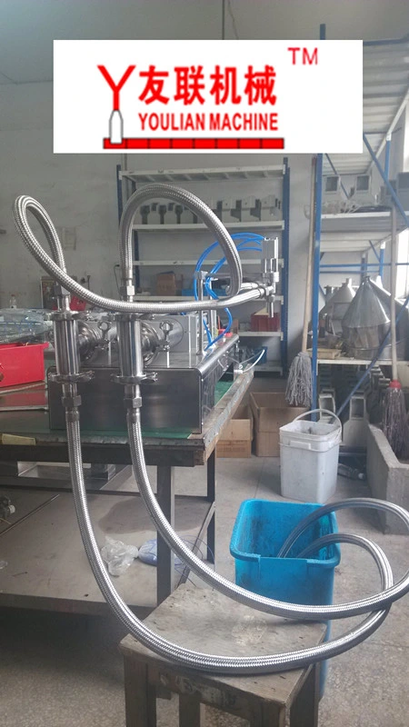 Two-Head Liquid Filling Machine (horizontal type) 100-1000ml
