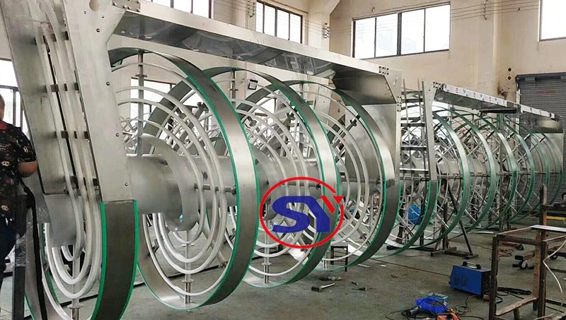 China Transmission Elevator Screw Conveyor Between Ceiling Beams for Plasic Barrel Basket Handling