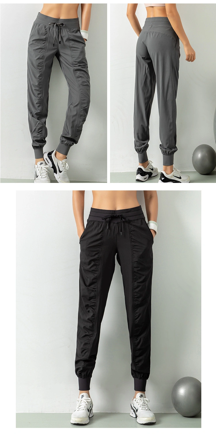 Customized Ruched Sports Windbreaker Cropped Trousers Women Tapered Yoga Track Stack Jogger Pants with Draw String